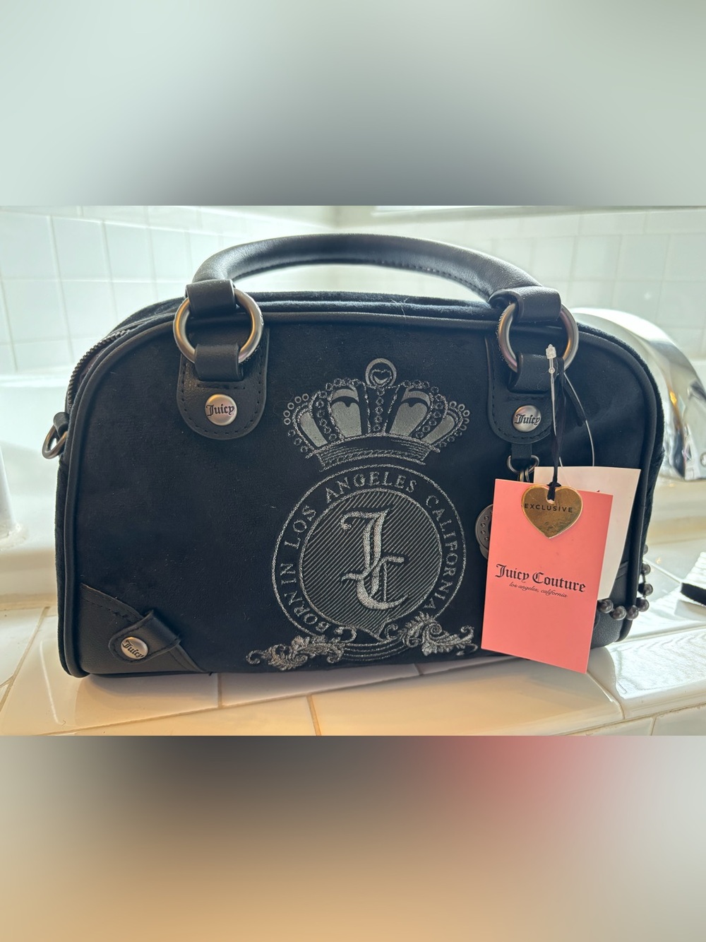 Juicy Couture Black Satchel with Silver Crest Embroidery